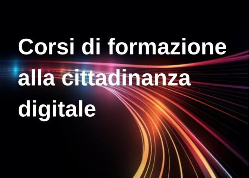 Scritta su corsi di formazione alla cittadinanza digitale. Sfondo scuro con linee luminose colorate.