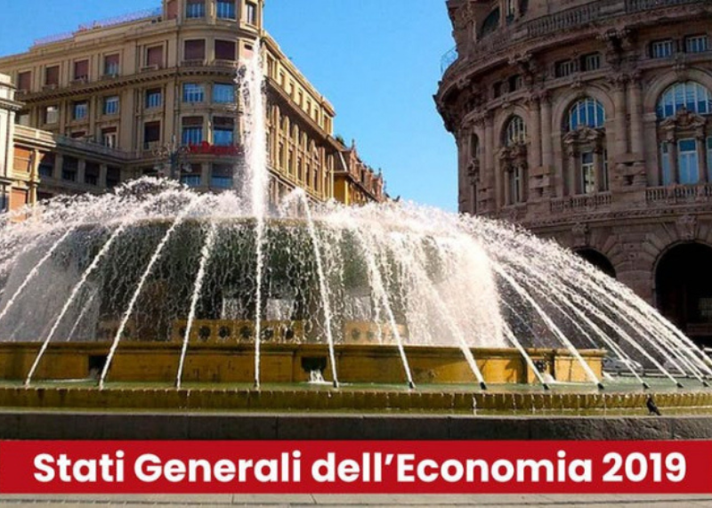Foto di piazza de Ferrari con fontana e banner “Stati Generali dell’Economia 2019”