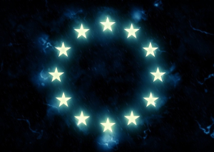 Cerchio di stelle dell’Unione Europea su sfondo scuro con effetto luminoso.