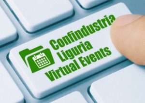 Immagine ravvicinata di un tasto di tastiera con la scritta verde “Confindustria Liguria Virtual Events” e icona calendario, premuto da un dito.