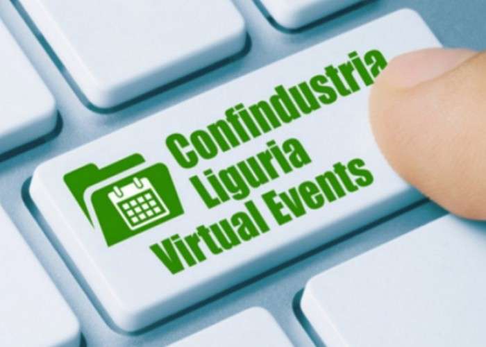 Immagine ravvicinata di un tasto di tastiera con la scritta verde “Confindustria Liguria Virtual Events” e icona calendario, premuto da un dito.